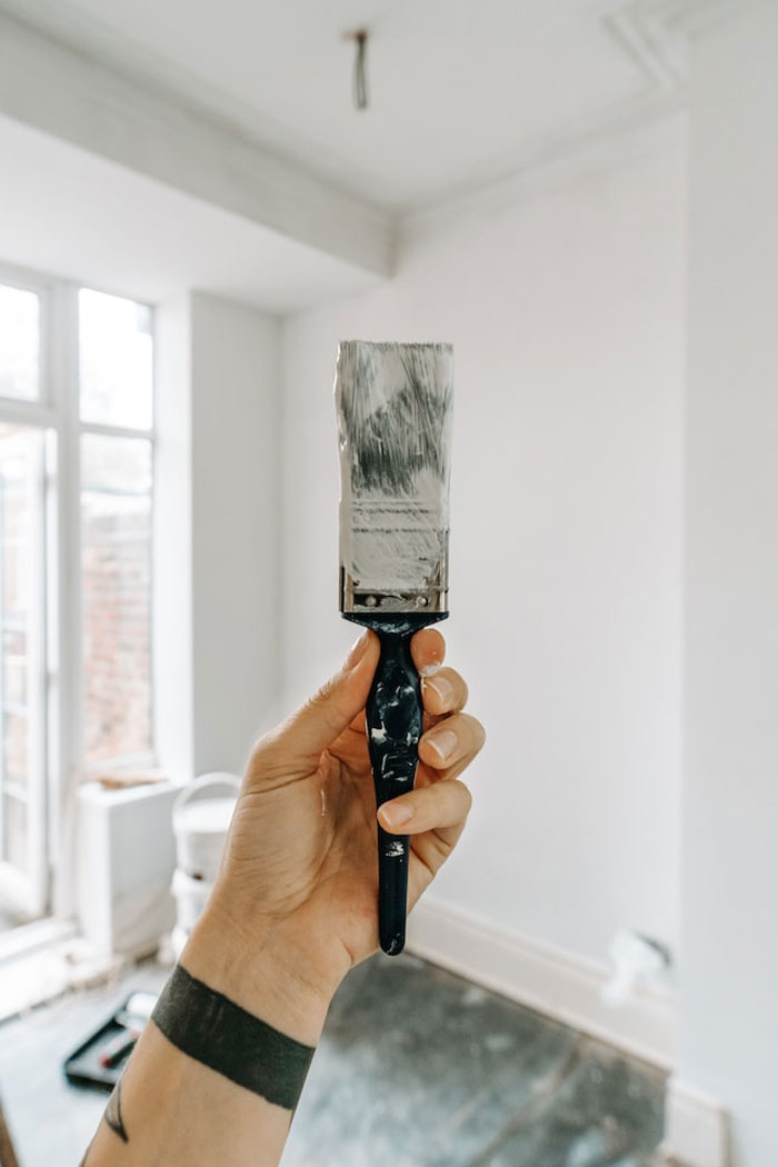 For dusting things like baseboards, windowsills, and picture frames, the best tool is a (clean) paintbrush. I always used to either use a cloth or something made specifically for dusting, but the paintbrush is much faster and easier. I keep a cheap 2-inch paintbrush exclusively for dusting now. Also works great on cobwebs.