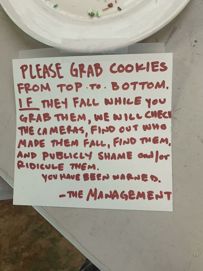 Strange threats - writing - Please Grab Cookies From Top To Bottom. If They Fall While You Grab Them, We Will Chect The Cameras, Find Out Who Made Them Fall, Find Them, And Publicly Shame and for Ridicule Them. You Have Been Warned. The Management