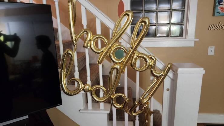 "Noticed something odd about the Happy Bday balloons my wife put up"