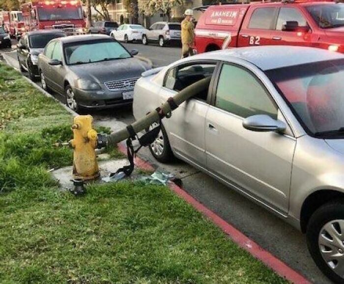 people who got owned by karma - fire hose through car windows
