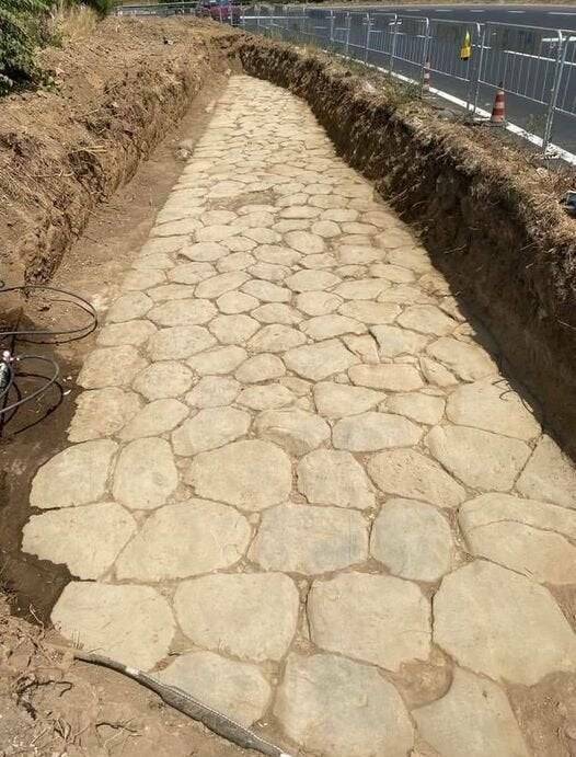 "A perfectly preserved section of the Via Flaminia Roman road, discovered at a depth of 0.90m during planning of a new water pipeline in Riano. The Flaminian Way struck north from Rome, over the Apennines to the Adriatic coast."