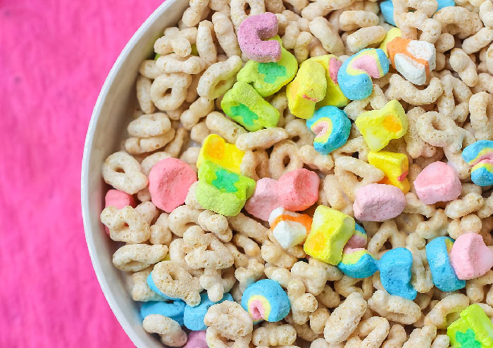 Lucky Charms were invented by a General Mills employee who chopped Circus Peanut candies into a bowl of Cheerios.