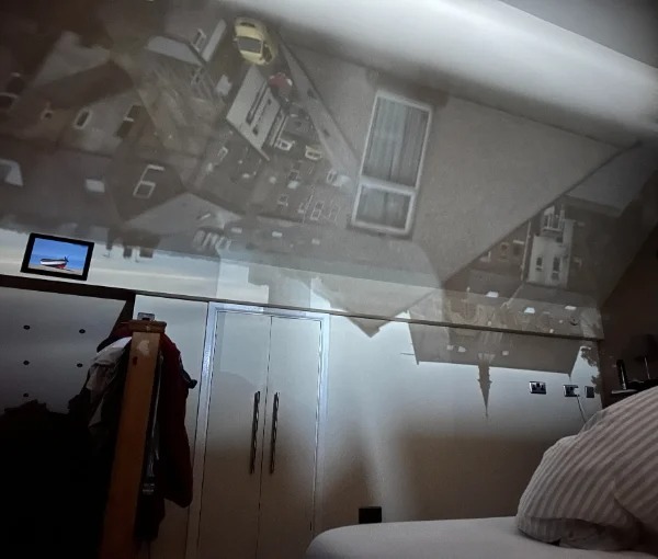 “When my blind is open just the right amount, my bedroom becomes a giant pinhole camera.”