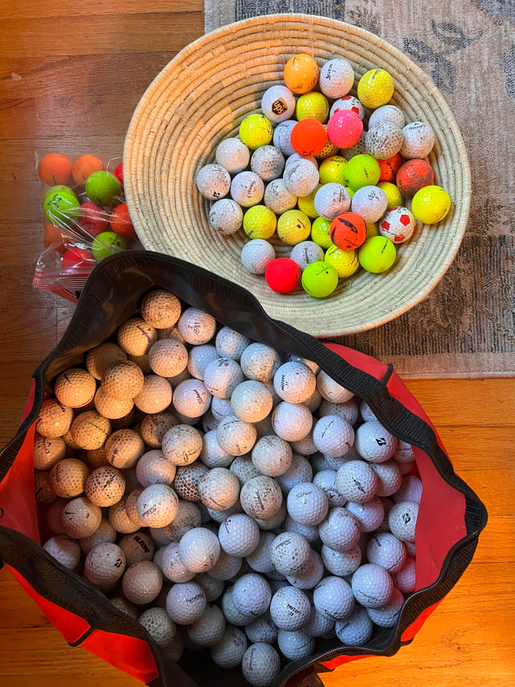“Golf balls collected over a few months walking in the woods by a golf course.”