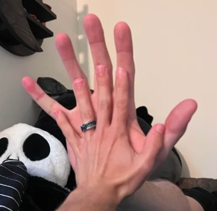 “My friend’s hands versus mine. I’m 5’2”- he’s 6’8″."