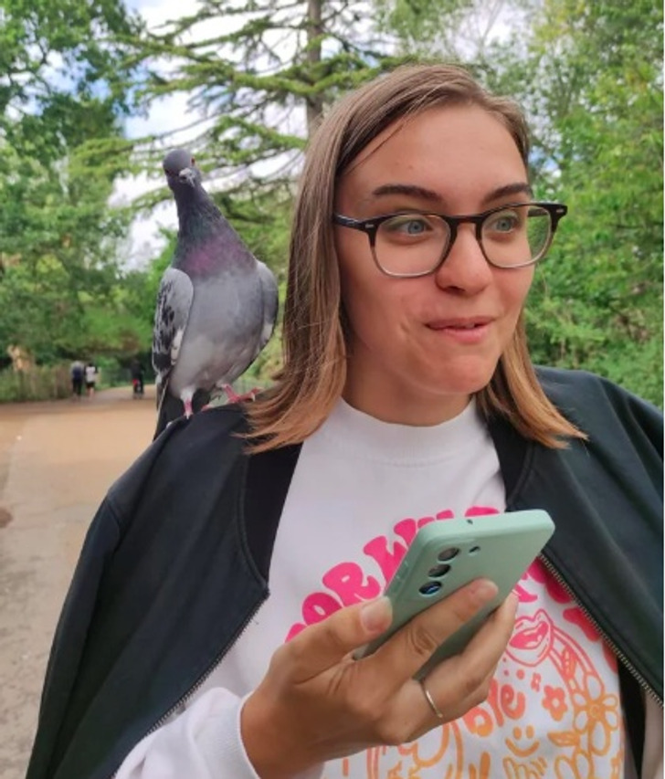 “I’m on a trip in London — today a pigeon decided to chill on my shoulder.”