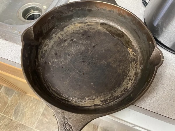 “Roommate scrapped my cast iron seasoning down to the metal and left water in it.”