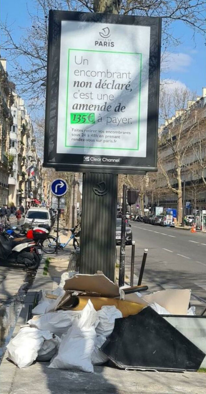 The Sign Says "Illegal Dumping On The Public Highway Punished With A Fine Of 135€"