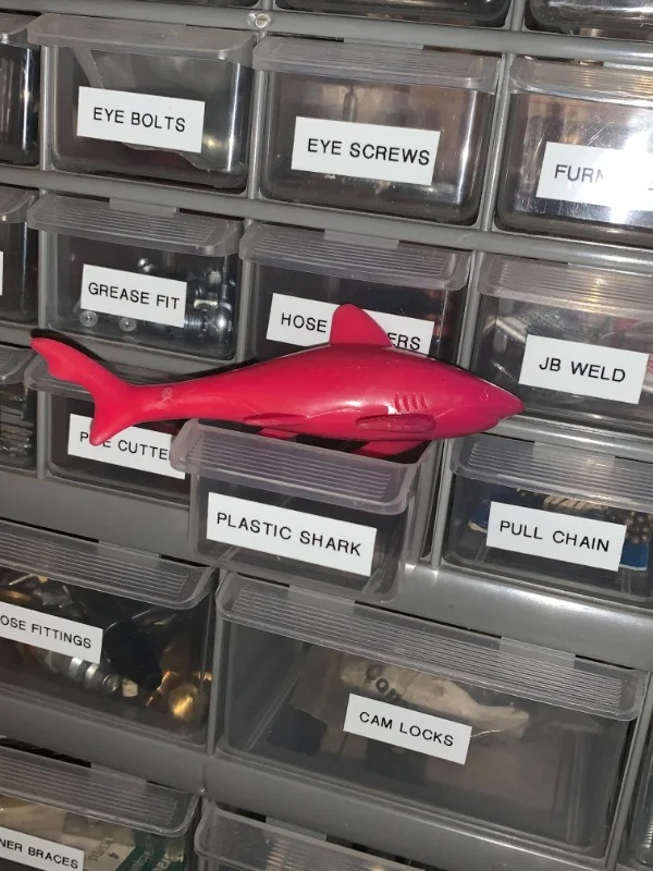 “My late father had a labeled drawer for a plastic shark among construction supplies.”