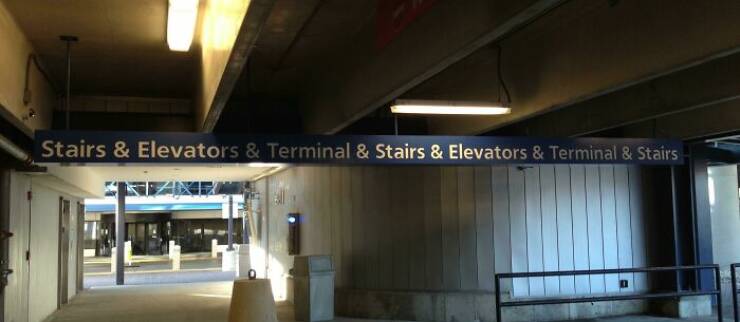 "The Almost Never Ending Airport Directional Sign."