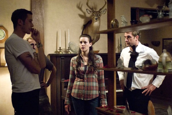 While shooting The Strangers (2008), director Bryan Bertino assures Liv Tyler and Scott Speedman there’s nothing strange to see here: