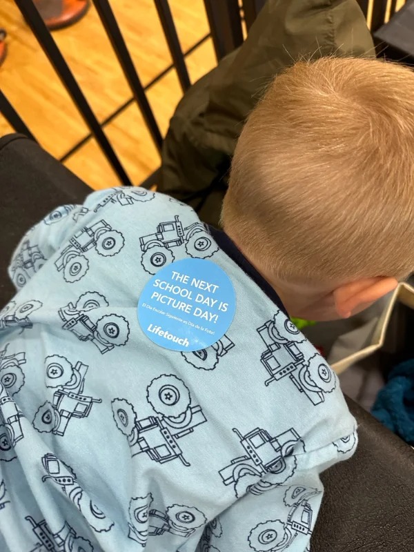 “My son came home with a sticker reminding us picture day was the next day.”