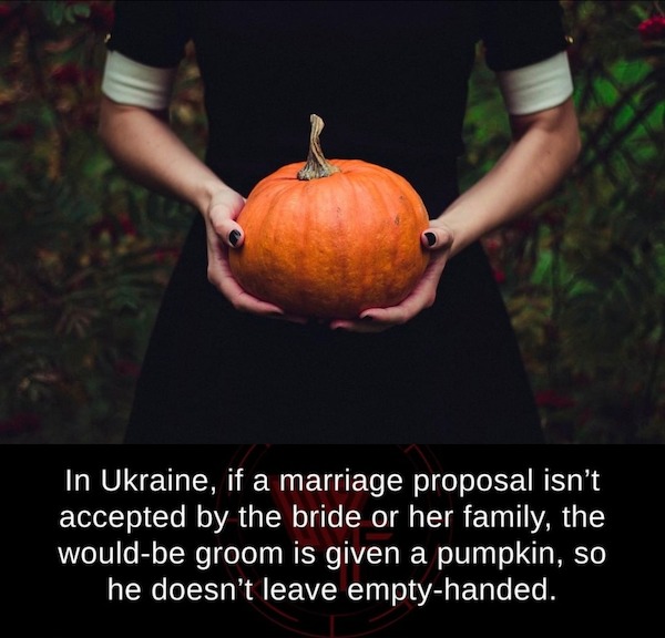 fascinating facts - woman holding pumpkin - In Ukraine, if a marriage proposal isn't accepted by the bride or her family, the wouldbe groom is given a pumpkin, so he doesn't leave emptyhanded.