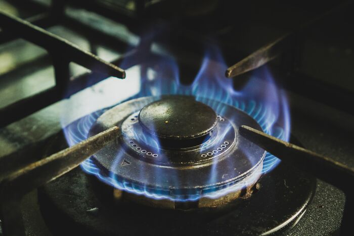 Always have baking soda at hand near the stove to put out fires. Never put out a fire on the stove or oven with water, in case there's grease.