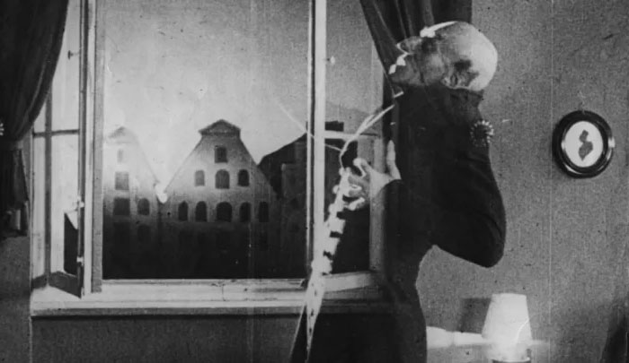 that Nosferatu plagiarized Bram Stoker's book Dracula. Stoker's estate sued them and attempted to destroy all copies of the film, but at least one copy made its way to the US where Stoker's book had already become public domain. For this reason, it survived and circulated as a cult classic.