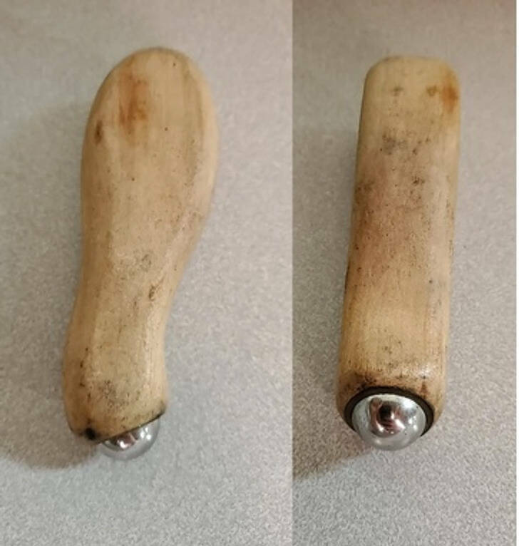 “No markings. Wooden handle that is surprisingly comfortable. The steel ball-like end is fixed and doesn’t roll or move.”

Answer: “It’s a leather shaping tool used in saddle-making. A friend of mine makes Western horse saddles, and his ’old’ tools look just like this.”