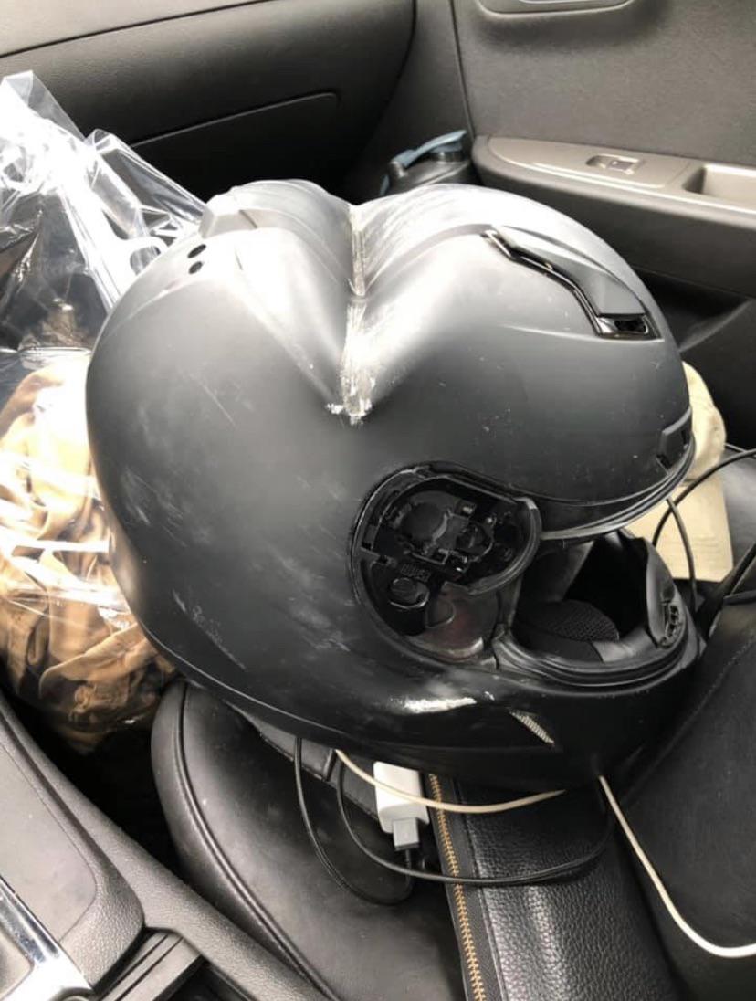 fascinating photos - guy throwing up in motorcycle helmet