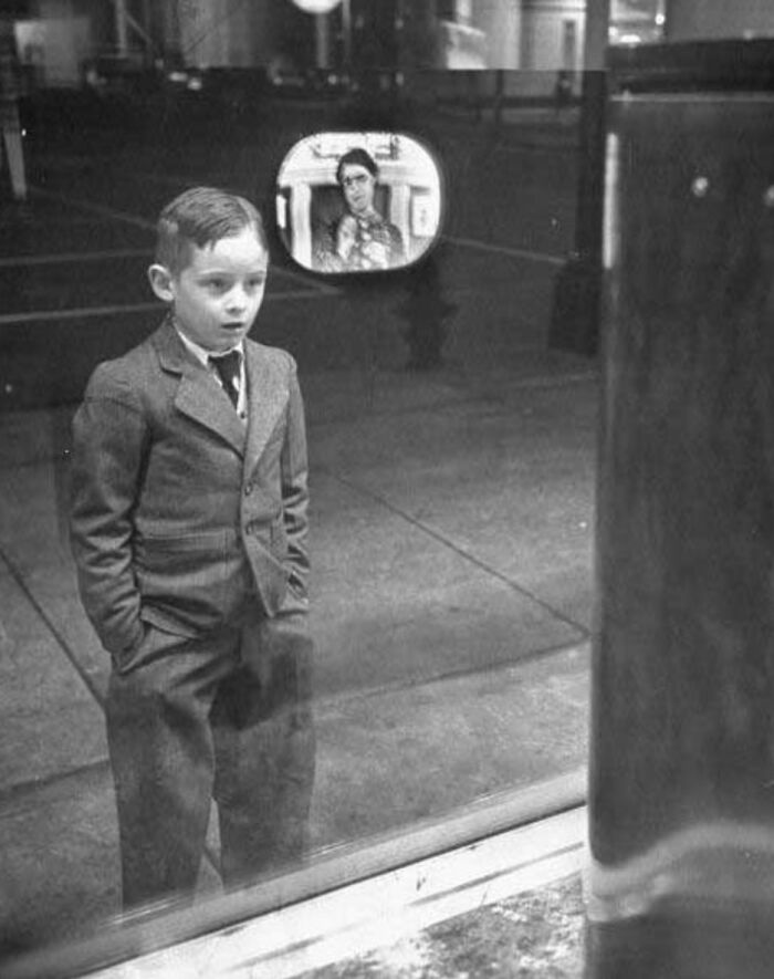 fascinating historical photos - boy watching tv for the first time