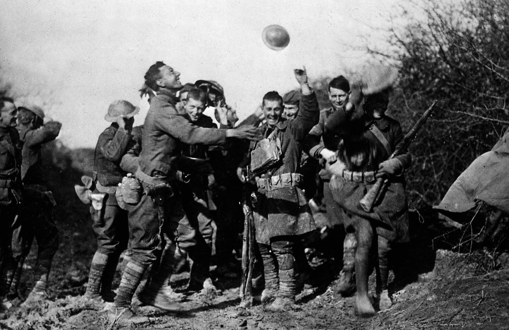 Soldiers celebrate the end of WW1, November 11th, 1918
