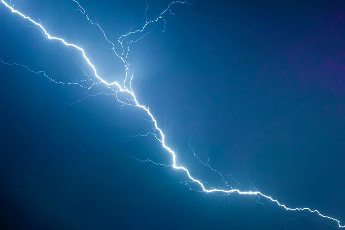 I was struck by lightning while talking on a landline. This was in the early 90s. Lightning struck the telephone line and traveled through the handset to my ear.

My parents drove me to the ER. I couldn't talk very well. My brain knew what I wanted to say, but my mouth didn't want to say it. I had a terrible stutter.

My doctor told me that I had had a 'dose of good, old fashioned electro-shock therapy'. My speech was normal the next day, but I get a terrible headache whenever a thunderstorm comes through.