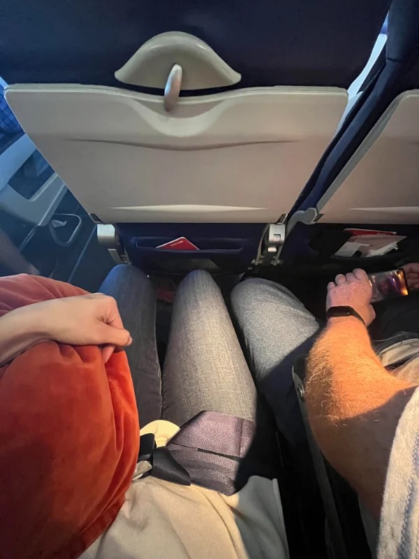 “This was how my entire 4 hour flight went today. I am a 5’8” female.”