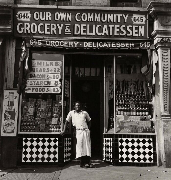 important historical pictures - grocers 1940 - 5 5 Seas Aang Mesan Realthfuk 645 Our Own Community 645 Grocery & Delicatessen 645 GroceryDelicatessen 645 MILK62 Ugar 5 22 Bacon 10 2abg Starch 8 Dog Food 3 13 cans Ce 10 Chuy L 10 F Occ