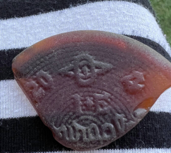 "I found this in Kaneohe Bay in Hawaii. It’s glass, but I’m wondering if anyone knows what it’s a part of."

“Looks like it could be a pre-1954 bottle from the Owens Illinois company based on the maker’s mark.”