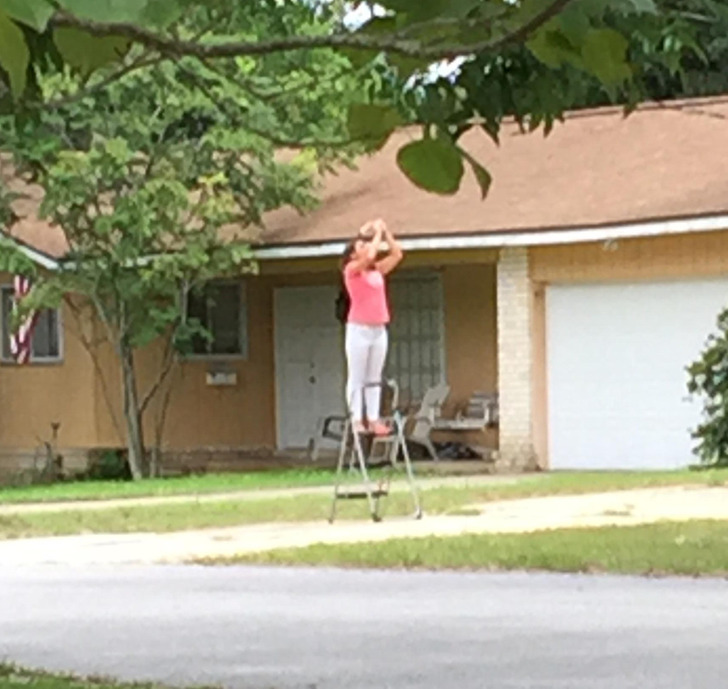 “I saw this woman getting a better view of the eclipse.”