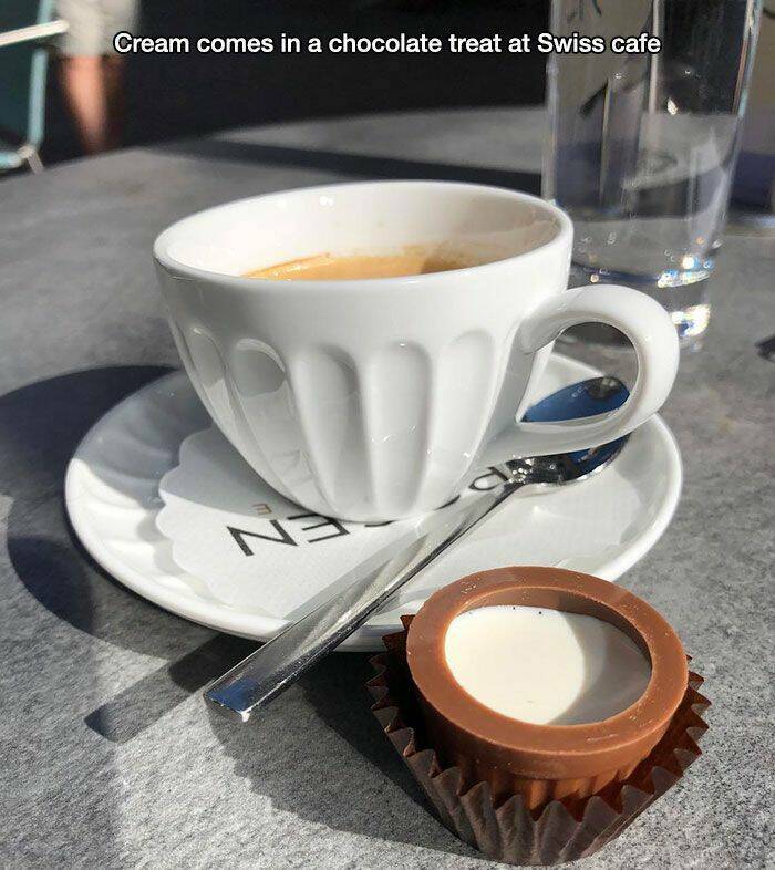 just plain awesome stuff - coffee cup - Cream comes in a chocolate treat at Swiss cafe N3