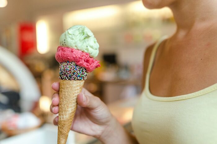 I was 15 and working at a local ice cream shop in the downtown area. I was in the back, making waffle cones, when I heard a knock on the window. This 60-some year old guy is waving to me, so I wave back and go back to paying attention to my cones. 20 minutes later, he’s still there watching me. I got nervous and went to the hallway, which is when he came in the shop. He asked my coworker how old I was, and she was kind enough to lie for me and said I was 13. He left after that.