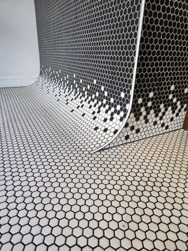 “The way these tiles form a smooth 90° transition instead of a hard corner at my local sandwich shop.”