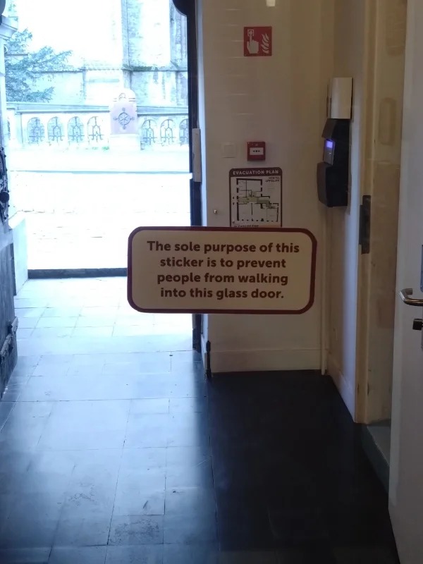 “This sticker in a hostel in Ghent preventing people from walking into a glass door.”
