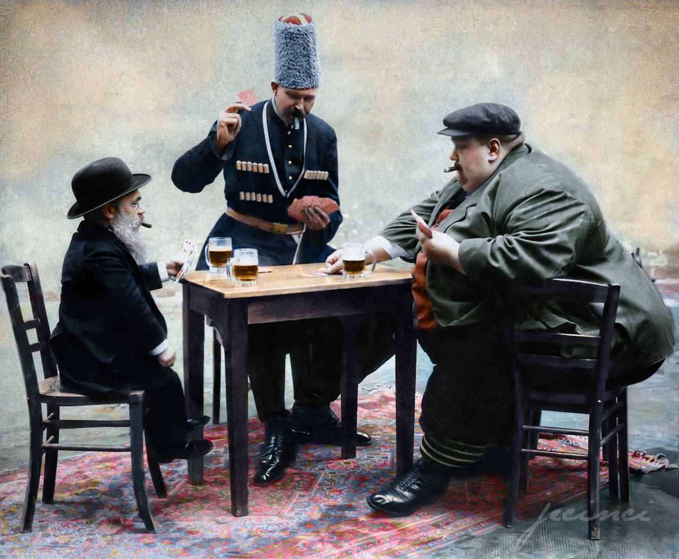 The tallest (Cornelius Bruns), shortest and fattest (Cannon Colossus) man of Europe playing a game of cards, 1913