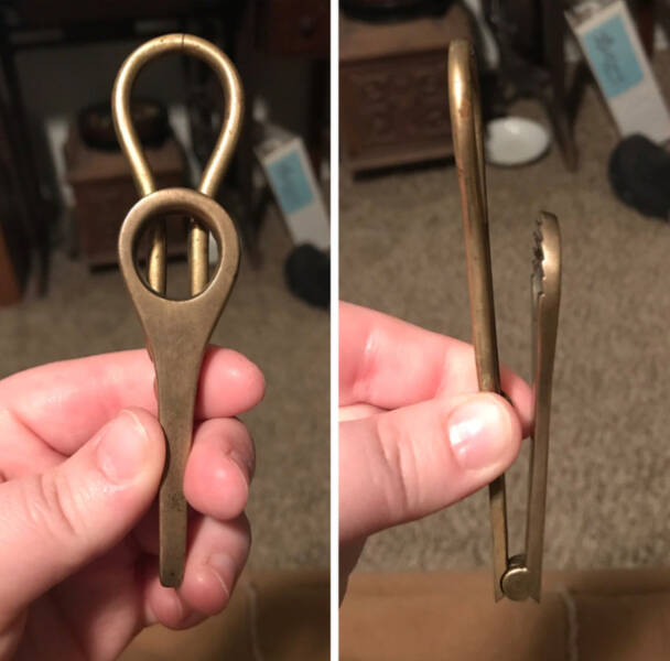 “Brass, 4” (long side) 3″ (short side), has a hinge that opens at a 90° angle. The inside of the smaller side has ribs along the inside.”

“It’s an old bubble-blowing wand, pre-1800s.”