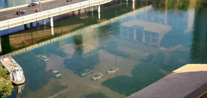 Interesting Reflection Caught On The Colorado River In Austin, Texas. Almost Looks Like An Underwater City