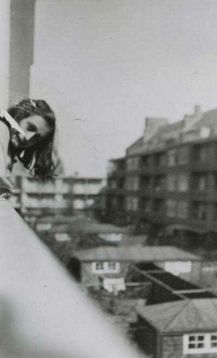 Anne Frank Pokes Her Head Out Of Her Family's Flat In Amsterdam, 1942