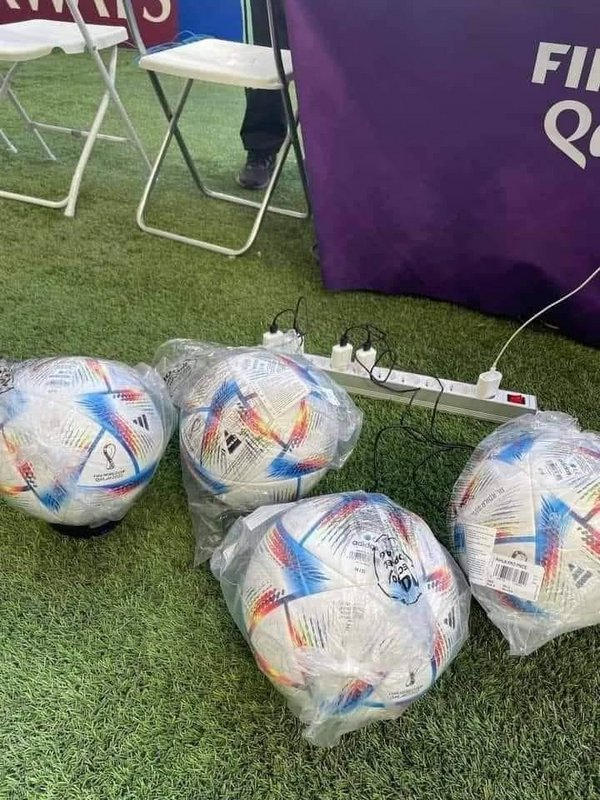 World Cup balls getting charged (They need to charge them because the ball has a 3D sensor inside to determine offsides)