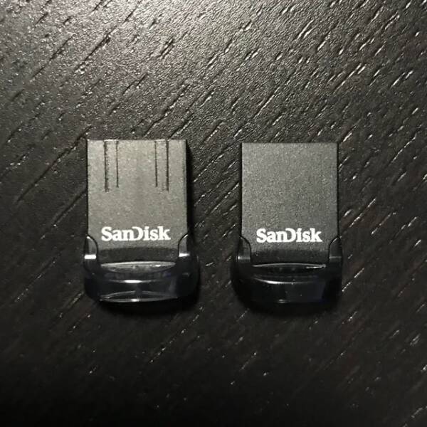 "My usb flash drives always show this sign of wear after being plugged in (left one is old, right one is fresh out of the box)"