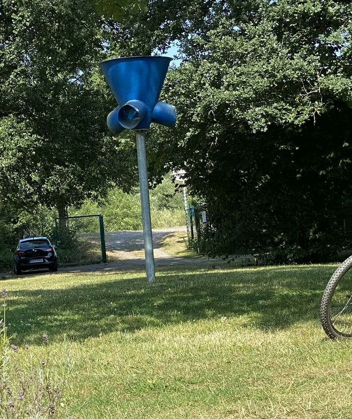 4m High Funnel With 3 Outlets Near A Playground And A Beer Garden In Germany.
Answer: It's a three-way basketball hoop (Balltrichter mit drei Ausgängen). You can score, but you don't know who gets the ball next. My kids school just got one. The kids love it.