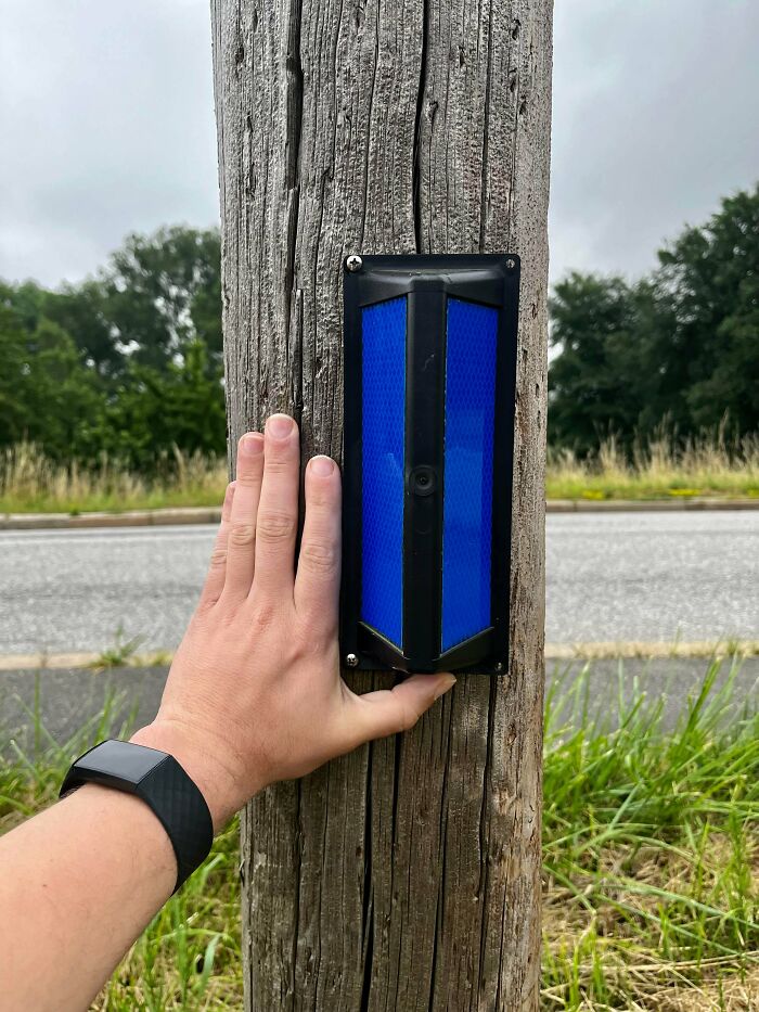 What Are These Blue Reflecting Markers For? Mounted On A Pole, Facing The Field.
Answer: They are reflecting the headlights of cars to the fields, so that deer avoids crossing the road. So it's for safety of cars and animals.