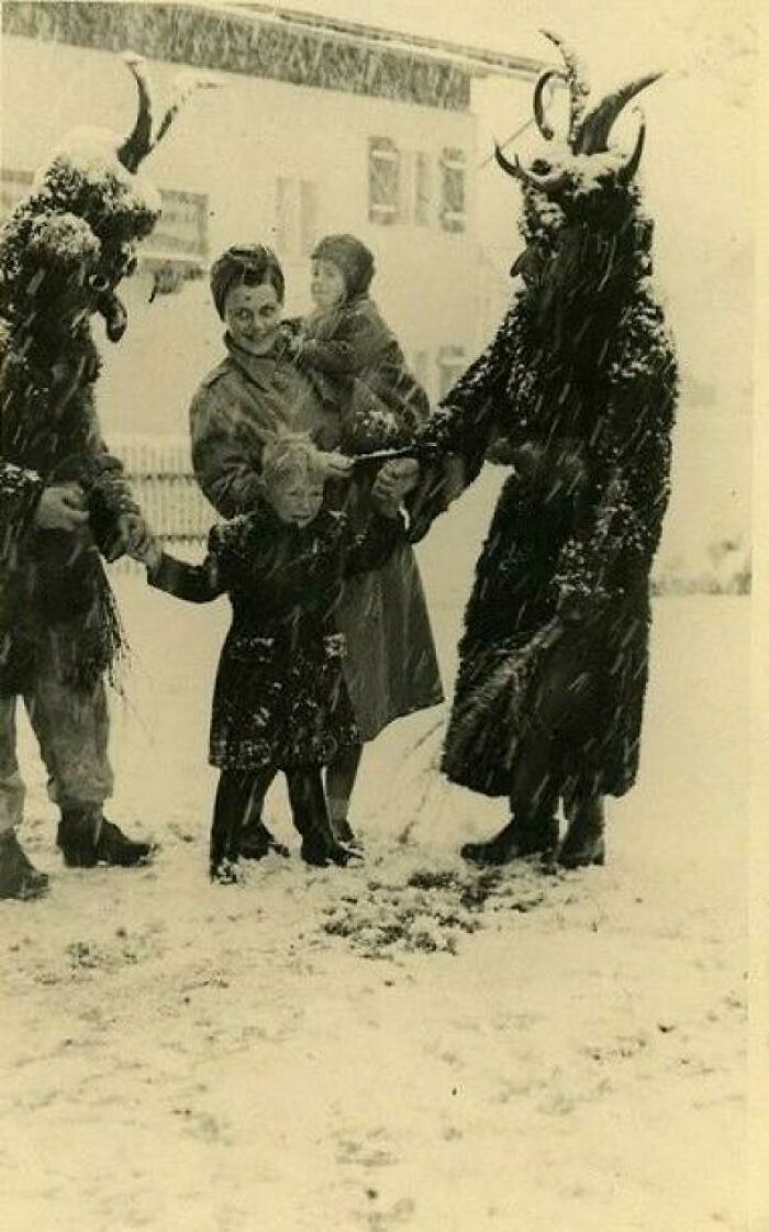 wtf pics from history - On The Feast Of St. Nicholas In The Town Of Bad Mitterndorf, Austria. St Nicholas Parades Through The Village On A White Horse Followed By The Krampus, Who Warn The Kids To Be Good, Or Else