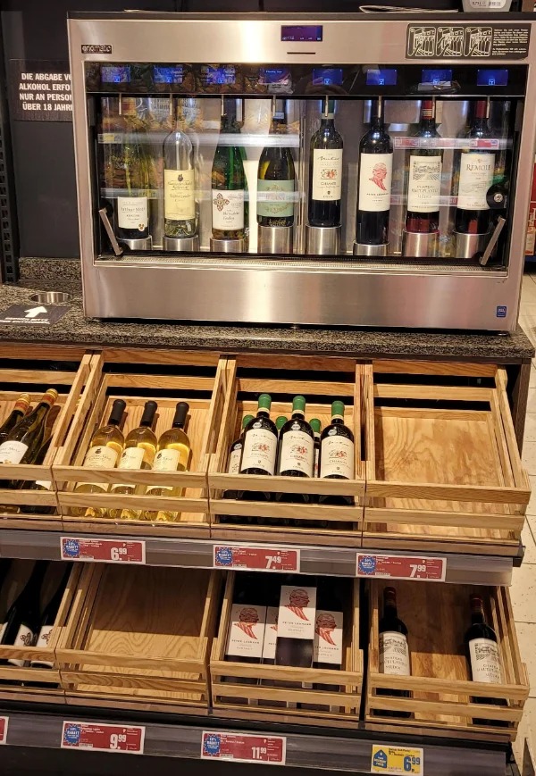 “A self-serve wine sample tap in a German supermarket.”