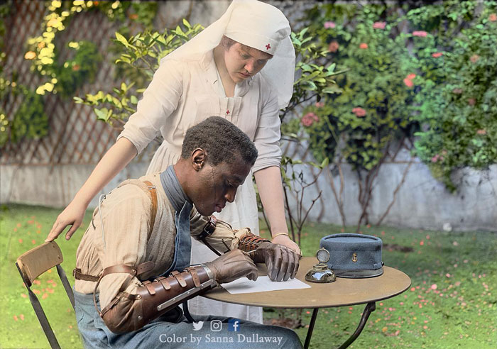 Senegalese Soldier Who Lost Both His Arms Writes A Letter With His New Prosthetic Limbs. At Vocational Rehabilitation School For Amputees, Paris 1918