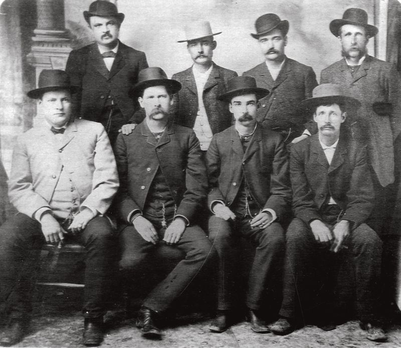 The “Dodge City Peace Commission” in 1883. Wyatt Earp is seated, second from left; Luke Short is standing, second from left; and Bat Masterson is standing, third from left.