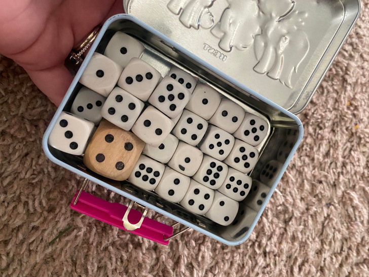 “We cleaned out our daughter’s room today and found a tin full of dice.”