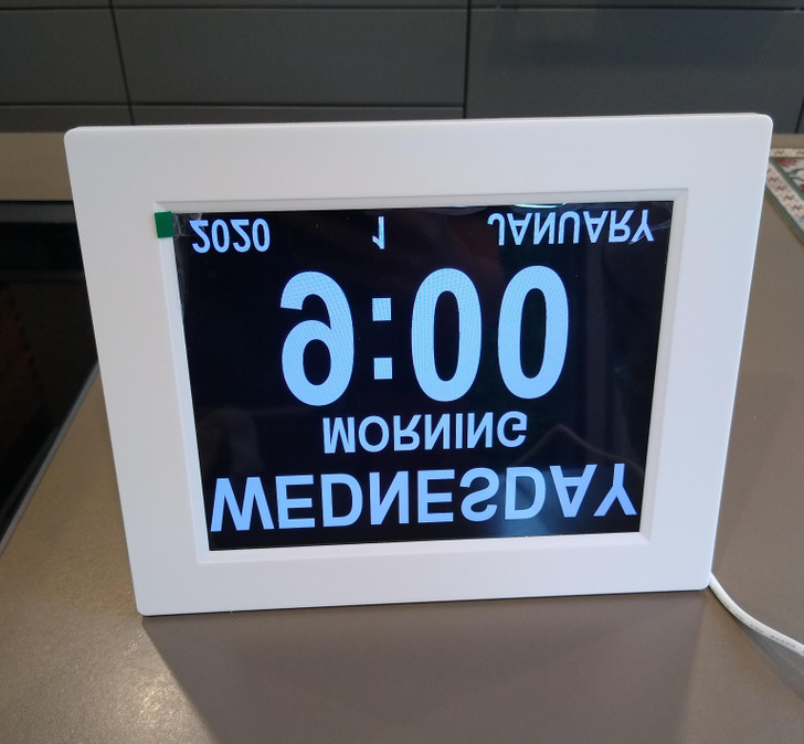 ’’My parents just bought this clock and the screen is both mirrored and upside down.’’