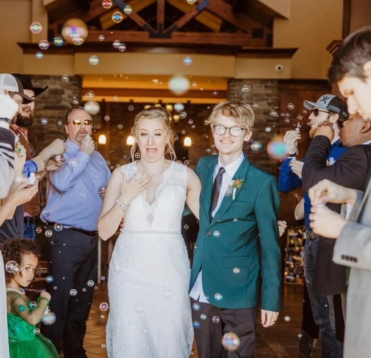 “My favorite wedding photo — I got a bubble in my eye while we were leaving.”