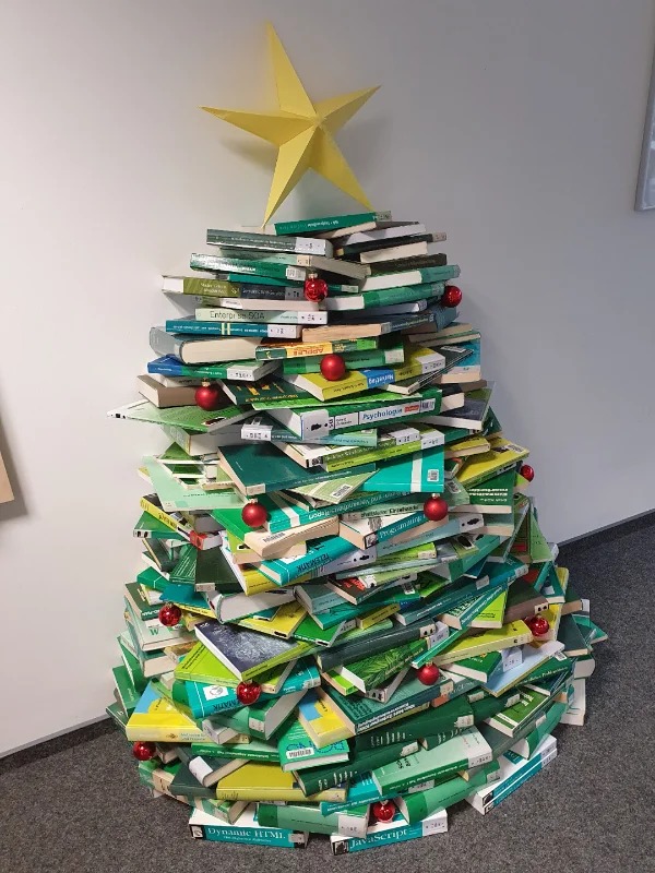 “My University library’s christmas tree made of books.”