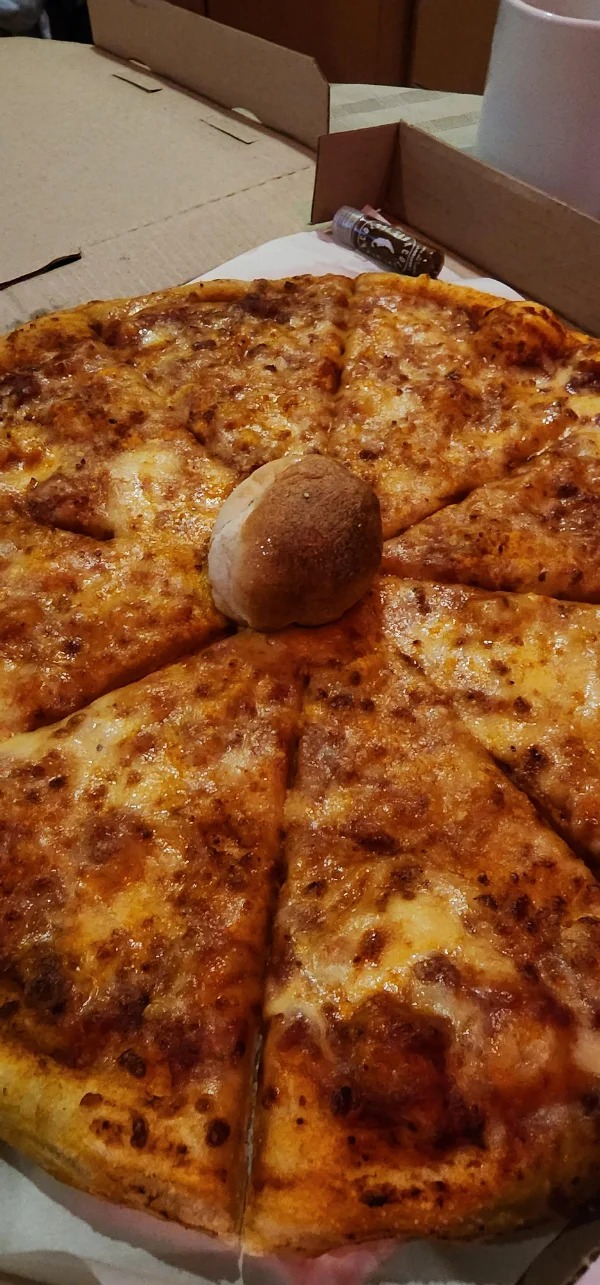 “a local pizzeria started using a dough ball instead of the plastic thingies to keep the pizza intact”