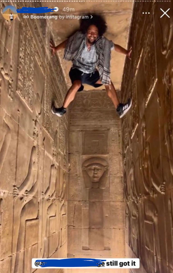 Tourist Scales Ancient Egyptian Antiquities.
